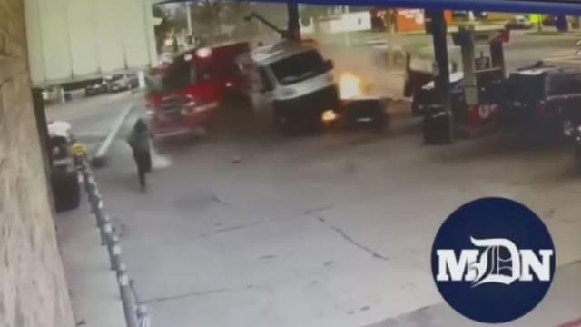 VIDEO: Detroit fire truck careens into east side gas station after SUV collision