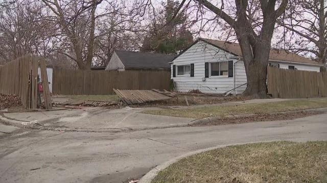 Residents left with damaged cars, fence after police crash leaves cleanup and questions