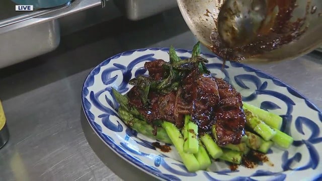 Preparing asparagus saltimbocca