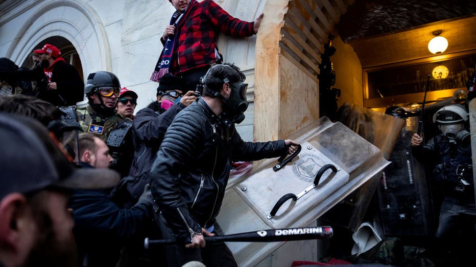 Trump supporters clash with police and security forces as people try to storm the U.S. Capitol on Jan. 6, 2021 in Washington, D.C. (Photo by Brent Stirton/Getty Images)