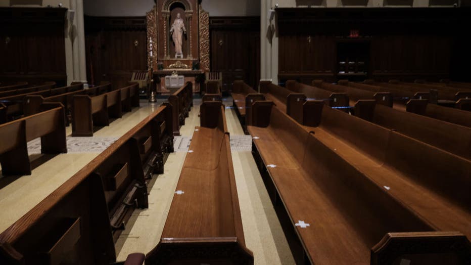 FILE - Empty pews are marked for spacing in a Manhattan church on Nov. 27, 2020 in New York City. (Photo by Spencer Platt/Getty Images)