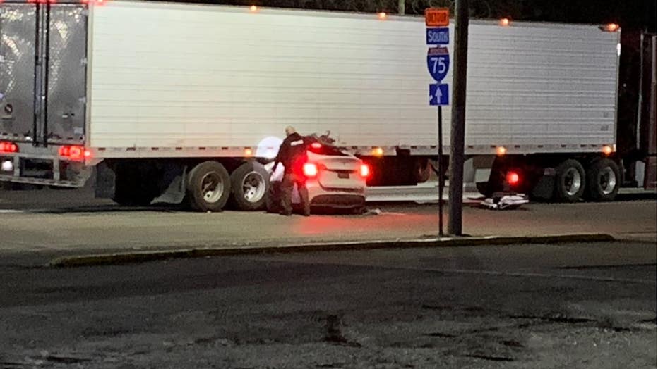 Tesla t-bones semi-truck in Detroit, gets wedged under trailer