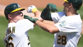 A's slug, pitch past Tigers 7-0 for 7th straight win