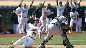 A's rally to beat Tigers in ninth, win eighth straight