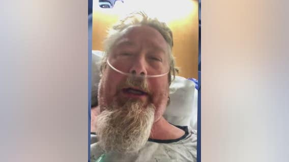 Hospitalized Covid patient says staff is 'overrun' with cases surging