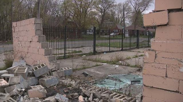 Detroit EMS crash sends unit through iron fence, into brick wall on east side