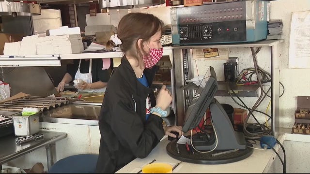 Rep Debbie Dingell becomes a restaurant server for an hour to highlight the 'Raise the wage Act.'