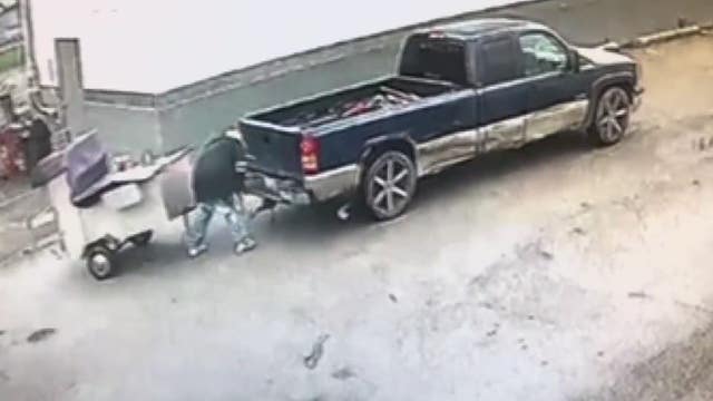 Thieves steal childrens' hot dog cart out of parking lot on camera