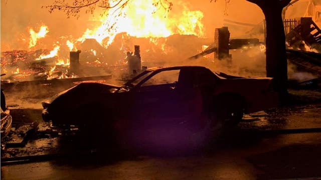 Two separate Detroit house fires spread to surrounding properties