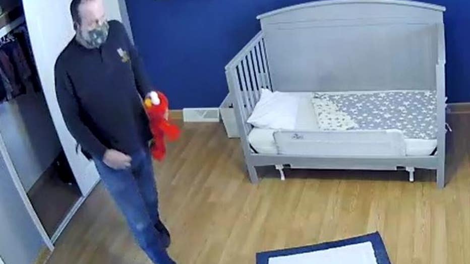 Camera still of Kevin Wayne VanLuven of Clarkston who allegedly pleasured himself with the Elmo doll during a home inspection.