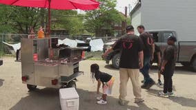 Father and son gets stolen hot dog cart replaced with generous gift