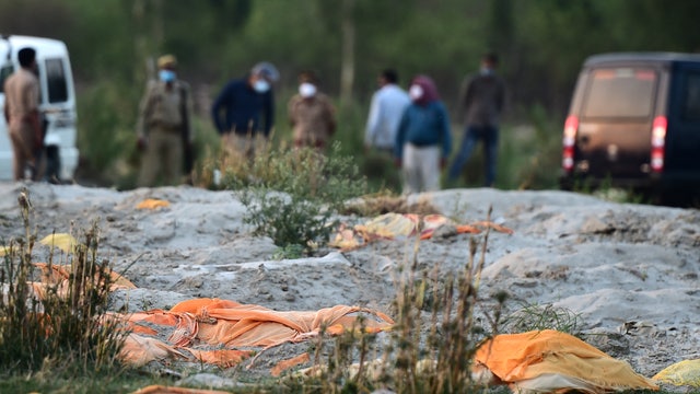 Hundreds of bodies found buried along Indian riverbanks believed to be COVID-19 victims