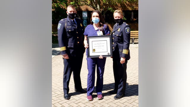 Ann Arbor police honor woman who risked own safety to help Briarwood Mall shooting victim