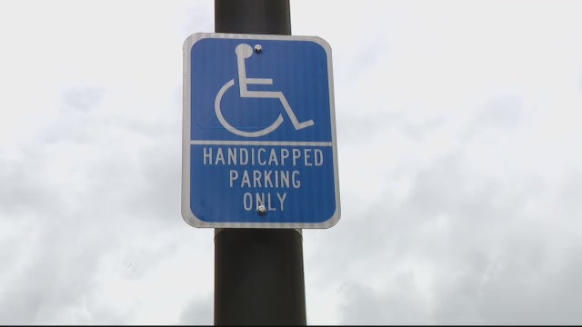 New handicap signs added after Detroit pizza shop owner gets city's attention by painting road blue
