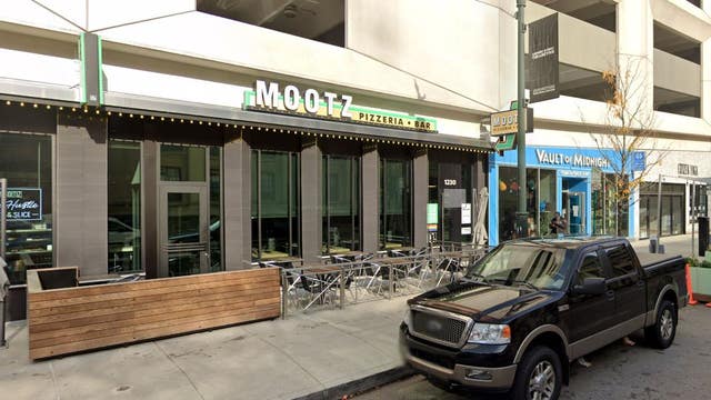 Detroit pizzeria owner fed up with $150 parking tickets, paints handicap zone blue