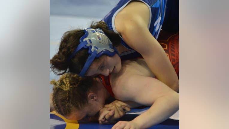 Girls will continue to compete on boys teams during the regular season and still can choose to wrestle in the boys individual and team tournaments.