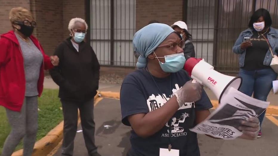 Protesters gather outside a Detroit post office, outraged with delays in delivery.