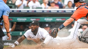 Grossman's 10th-inning squeeze bunt lifts Tigers over Astros