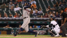 Correa leads Astros to 11th straight win, 12-3 over Tigers