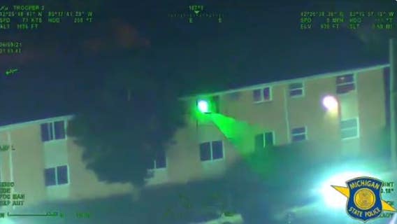 Man arrested for shining laser at state police helicopter in Detroit