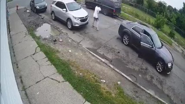 Detroit Police release video of man jumping from car, shooting 11-year-old boy and father