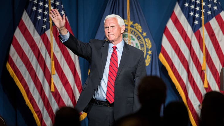 Former Vice President Mike Pence waves after addressing the GOP Lincoln-Reagan Dinner on June 3, 2021 in Manchester, New Hampshire. (Photo by Scott Eisen/Getty Images)