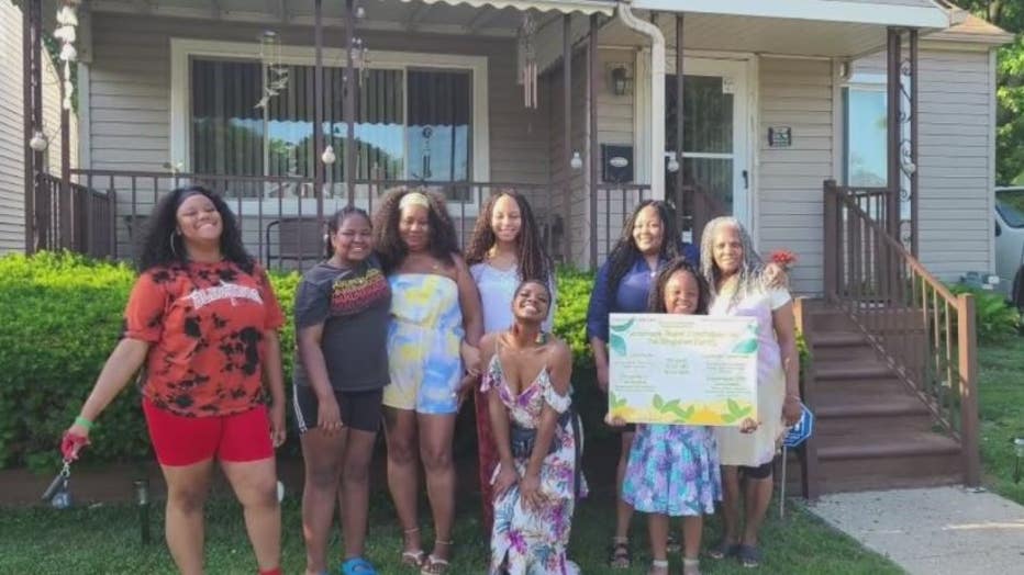 The Singletons in front of their family home they are trying to save.