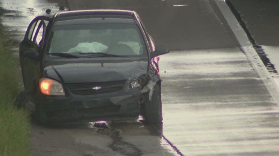The victims were shot inside this car on I-96 near Scotten.
