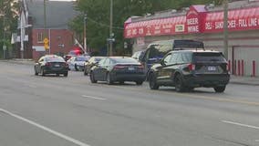 2 shot, 1 killed inside car, causing crash on Detroit's east side