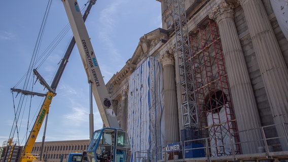 Last capital stone installed on Michigan Central Station façade; roof restoration is next