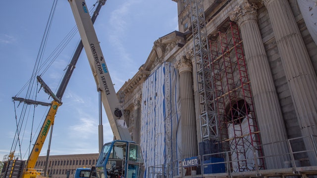 Last capital stone installed on Michigan Central Station façade; roof restoration is next