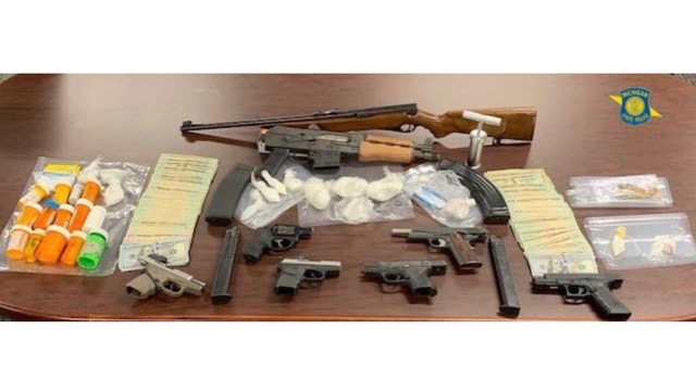 More than 300 grams of cocaine, 20 grams of heroin, guns, other drugs seized from suspected Detroit dealer