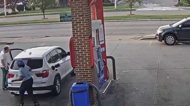 Woman fights off man trying to steal BMW while she pumps gas at Detroit gas station