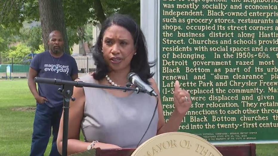 Commissioner Robin Terry in front of the new Black Bottom historical marker.