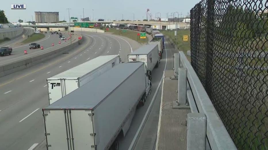 The line stretches at least seven miles long to cross into Windsor Friday.