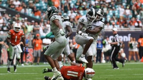 Spartans run: Michigan State rolls past No. 24 Miami, 38-17