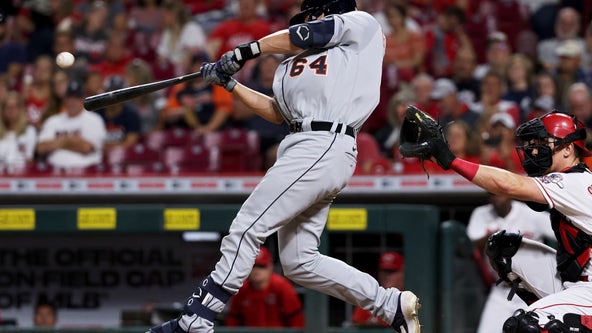 Garneau slugs 2 homers, Tigers pound reeling Reds 15-5