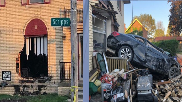 Speeding car crashes into - and through house on Detroit's east side