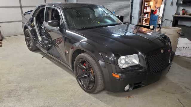 Police find car that hit River Rouge cop without racing stripes, side door