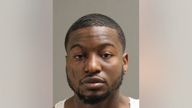 Man charged with shooting another man in the face in Warren Police parking lot