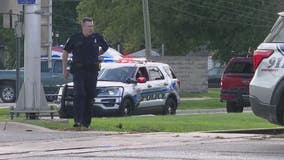 2 employees shot outside auto sales business in Clinton Twp; search continues for gunman