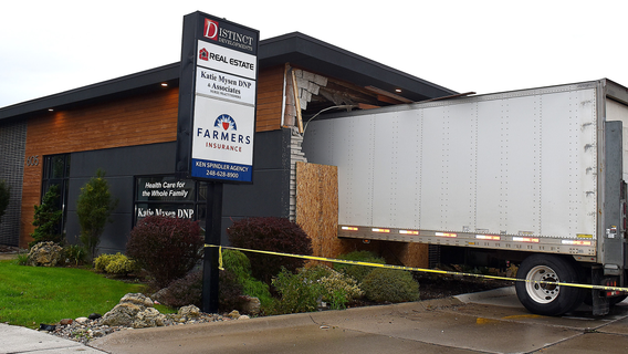 Semi crashes into building in Oxford, deputy commended for bravery