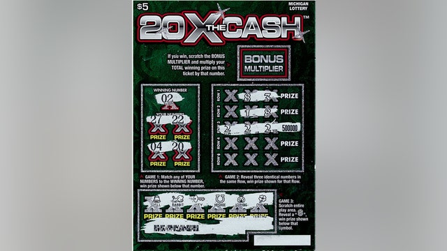 Genesee County man wins $500K on scratch-off lottery ticket he bought when he stopped to put air in tire