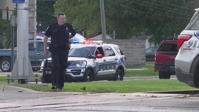 2 employees shot outside auto sales business in Clinton Twp; search continues for gunman
