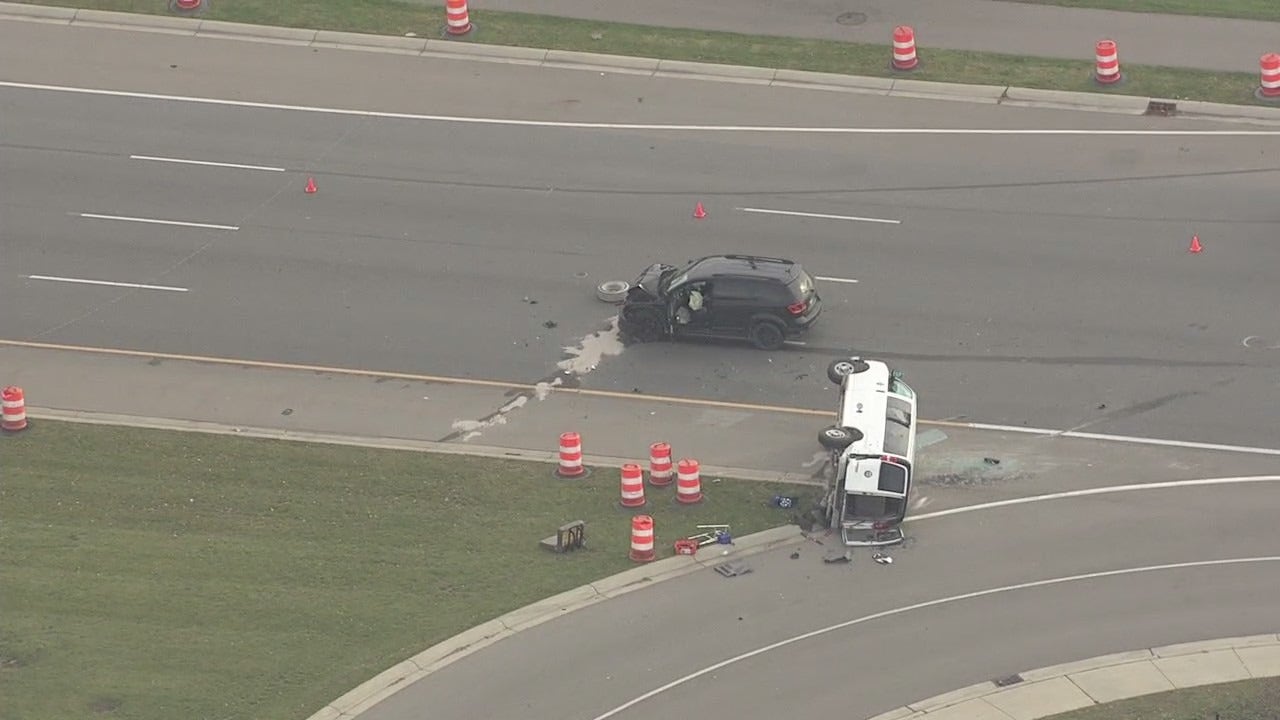 Eastbound Hall Road down to one lane in Clinton Township after twocar