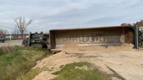 Semi full of sand flips on US-23, closing southbound lanes