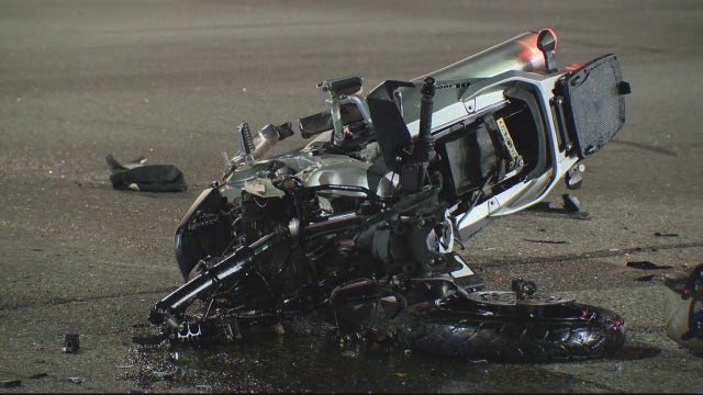 Witness says motorcyclist in fatal crash ran red light and struck pickup truck