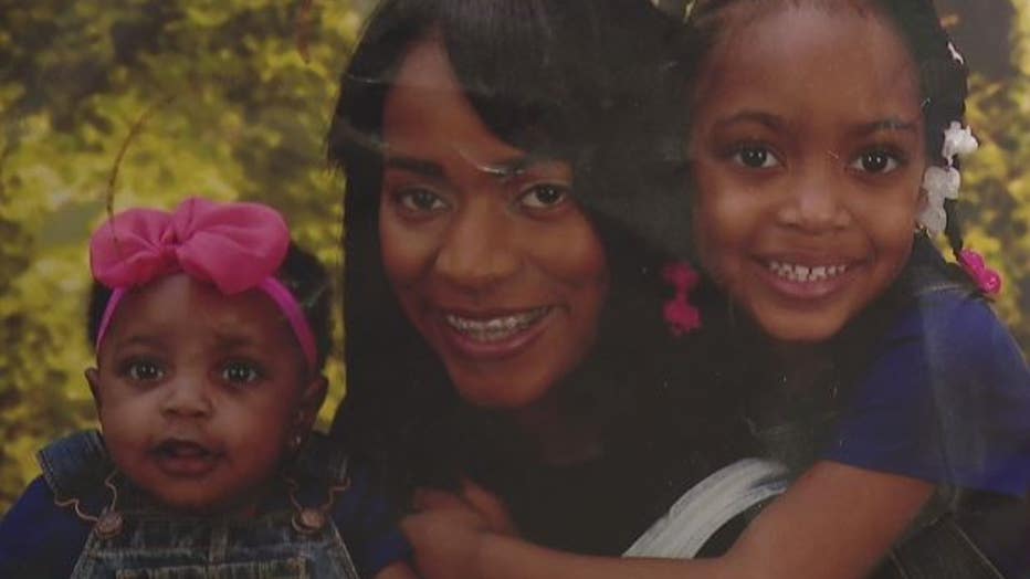 Victim Johnice Clark pictured with her two daughters.