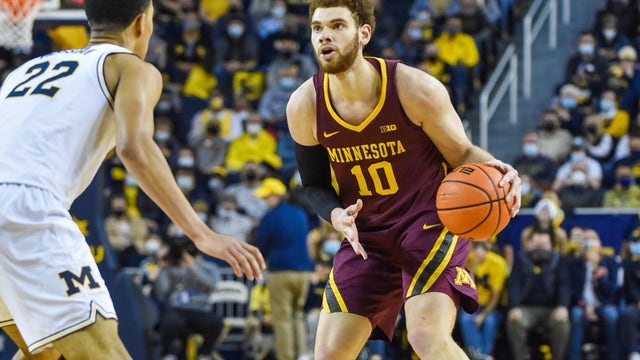 Battle's season-high 27 boosts Minnesota past Michigan 75-65