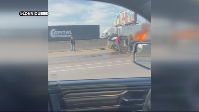 Video shows men rescuing 2 from burning SUV on I-94 in Detroit